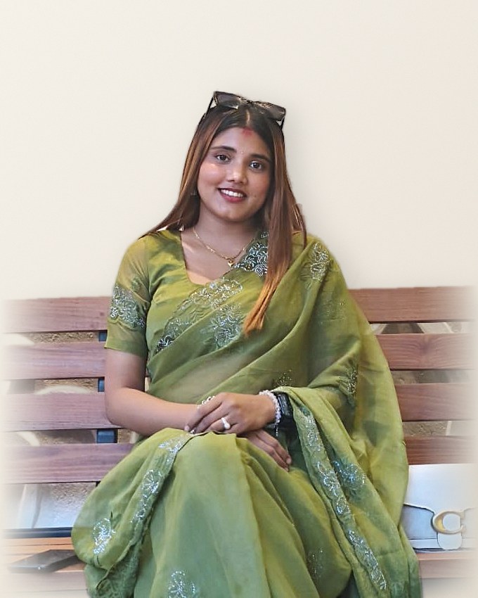 Portrait of Sudipa Subedi wearing a green embroidered saree